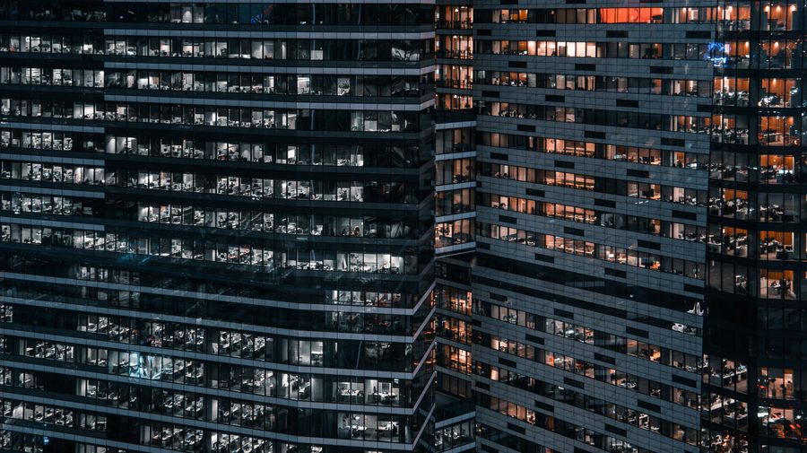 Rows of racks across a large data hall