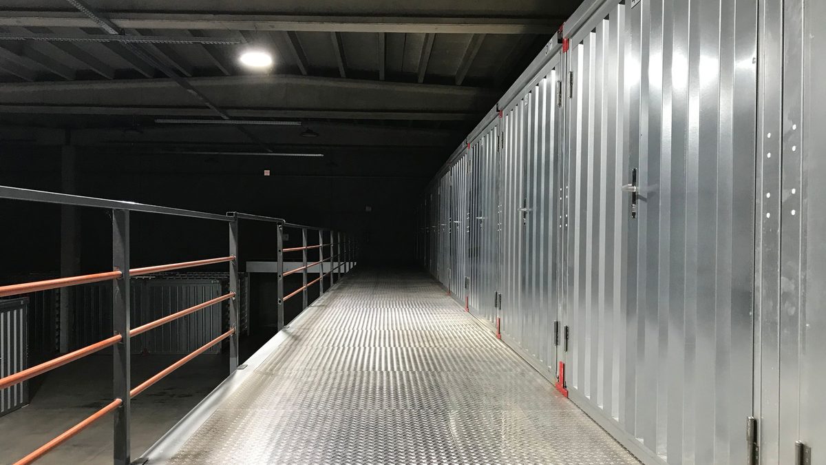 A clean service corridor running through a data hall
