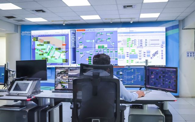 An operator at a monitoring console