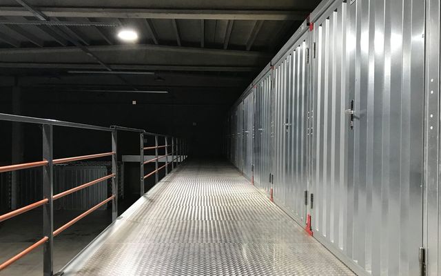 A service corridor carrying containment