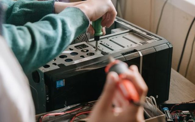Hands servicing rack hardware