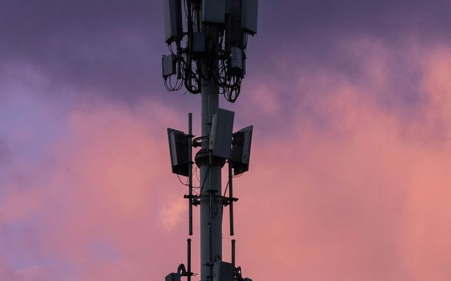 A telecommunications mast at dusk