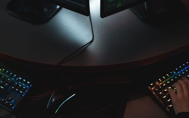A security operations desk under low light